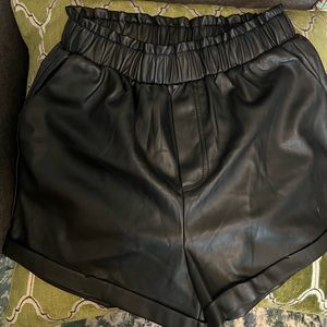 Pleather stretchy shorts. Super comfy.